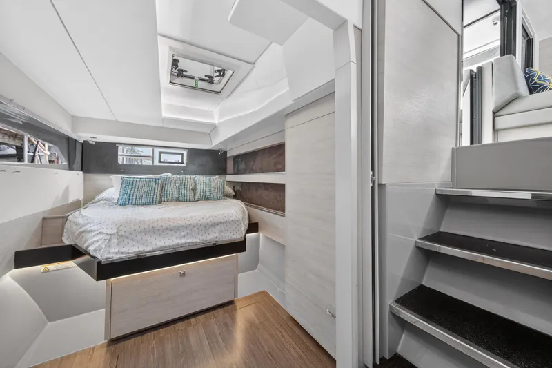 Slide: The Image of Luxurious 2021 Leopard 50 yacht interior with modern bedroom and sleek staircase design. - 62