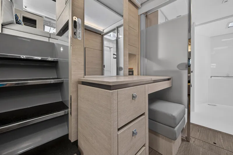 Slide: The Image of Modern interior of 2021 Leopard 50 yacht with sleek stairs and elegant cabinetry. - 65