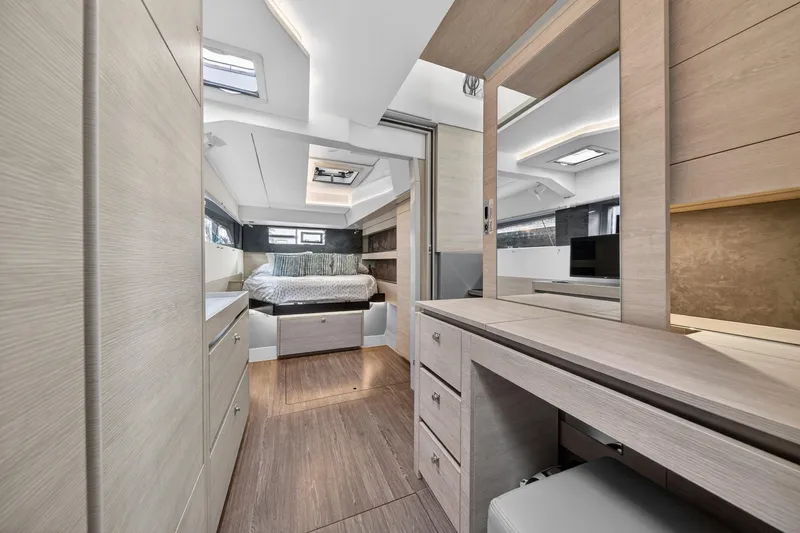 Slide: The Image of Luxurious interior of 2021 Leopard 50 yacht featuring modern bedroom and elegant wood finishes. - 66