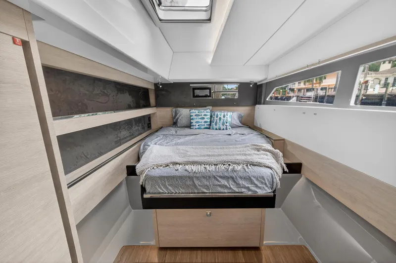 Slide: The Image of Luxurious bedroom interior of 2021 Leopard 50 yacht with modern design and cozy bedding. - 87