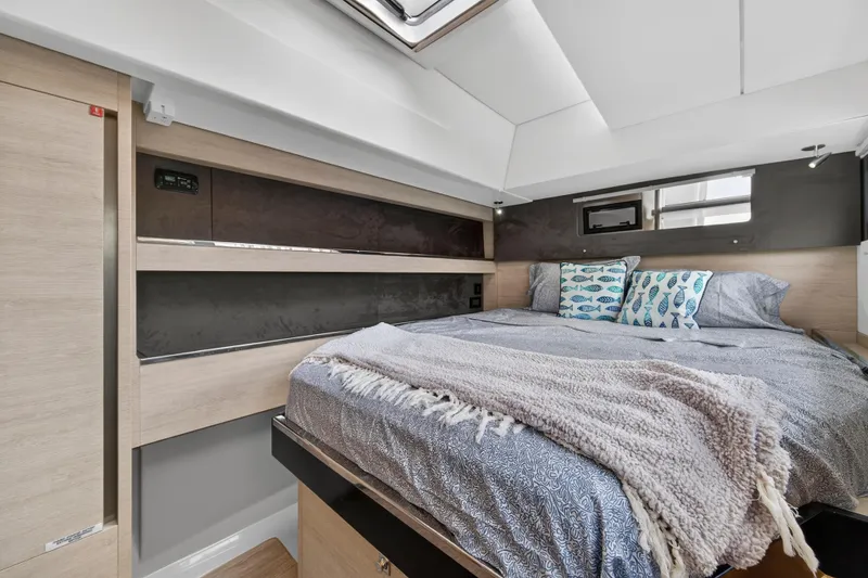 Slide: The Image of Luxurious bedroom interior of 2021 Leopard 50 yacht with cozy bedding and modern design. - 88