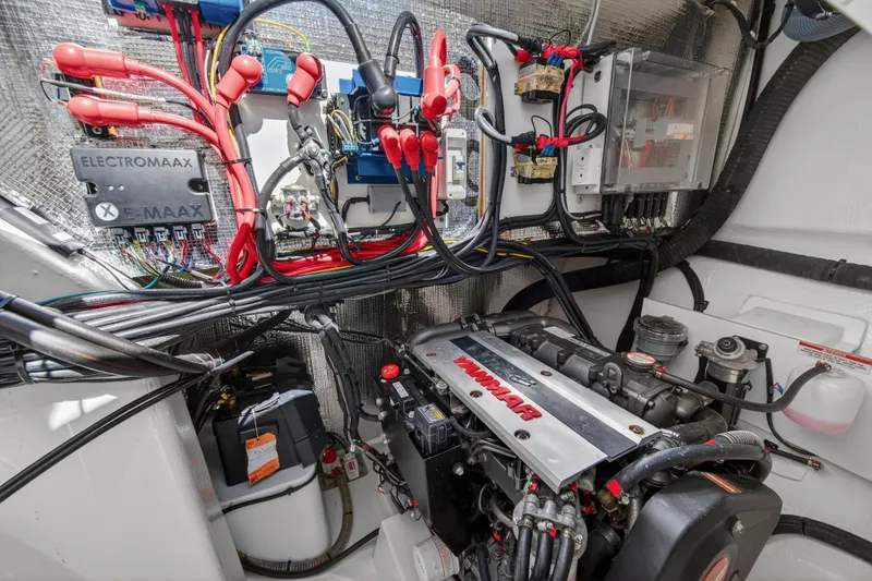 Slide: The Image of Modern bathroom vanity in 2022 Leopard 50 yacht, featuring sleek wood finish and storage drawers. - 111