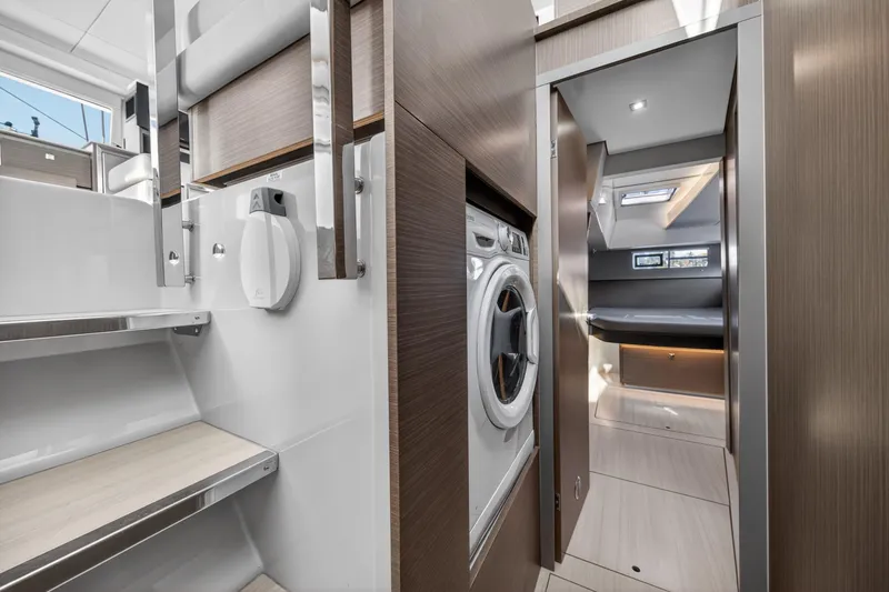Slide: The Image of Modern interior of 2022 Leopard 50 yacht with washer and sleek design. - 132