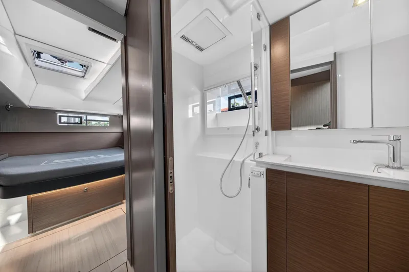 Slide: The Image of Modern interior of 2022 Leopard 50 yacht featuring bedroom and bathroom. - 133
