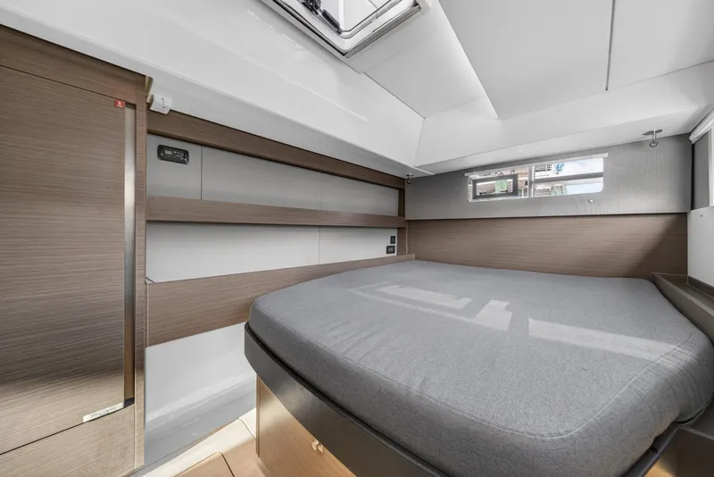 Slide: The Image of Modern cabin interior of 2022 Leopard 50 yacht with sleek design and comfortable bed. - 135