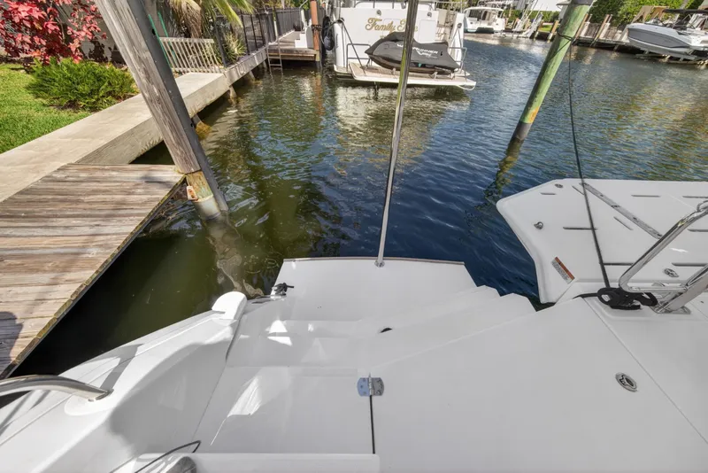 Slide: The Image of Stern view of 2022 Leopard 50 yacht docked at marina. - 144