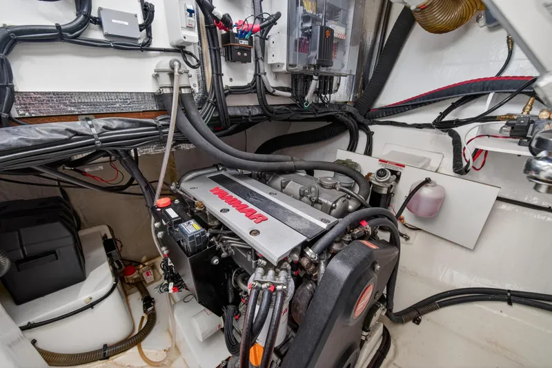 Slide: The Image of Engine room of a 2022 Leopard 50 yacht, featuring a Yanmar engine. - 145