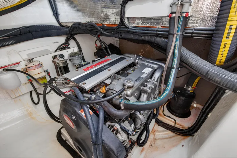 Slide: The Image of Engine room of a 2022 Leopard 50 yacht, featuring a Yanmar engine. - 147