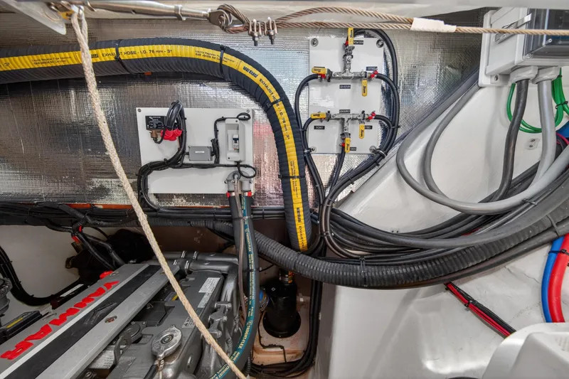 Slide: The Image of Engine room of 2022 Leopard 50 yacht with Yanmar engine and wiring. - 148