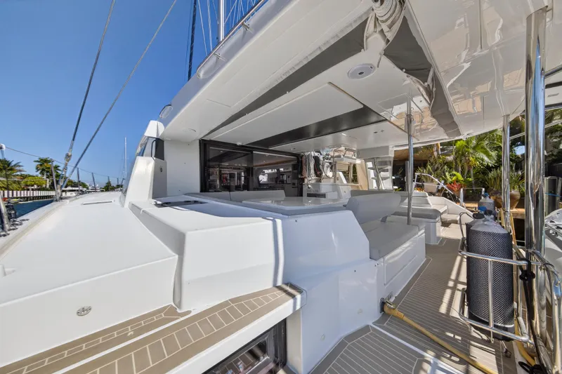 Slide: The Image of Engine compartment of a 2022 Leopard 50 yacht, featuring a Yanmar engine. - 21