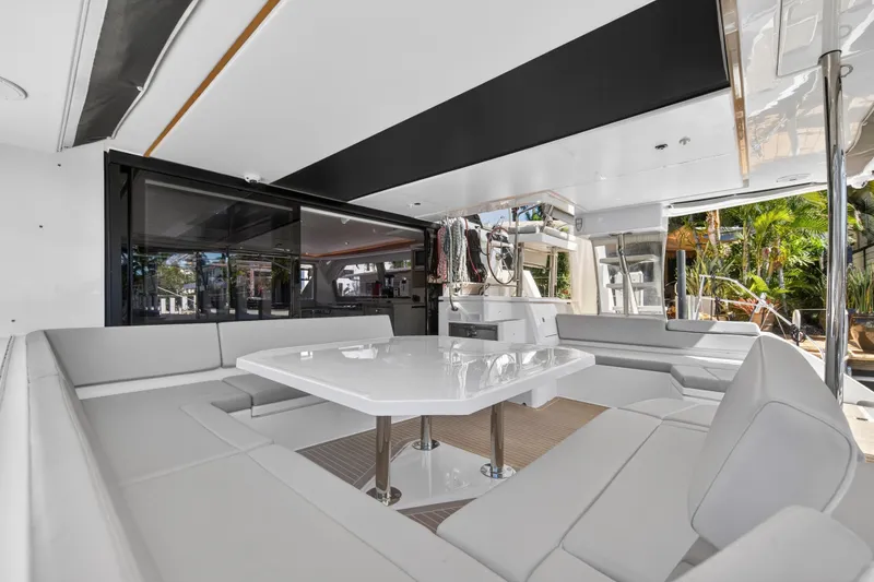 Slide: The Image of Docked Leopard 50 yacht, 2022 model, with marina view and wooden dock. - 22