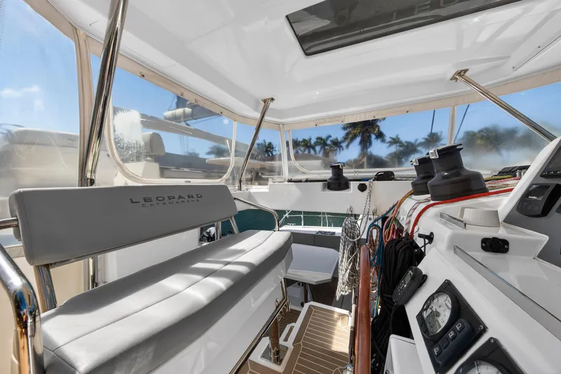 Slide: The Image of Colorful ropes and winches on a 2022 Leopard 50 sailboat deck. - 30