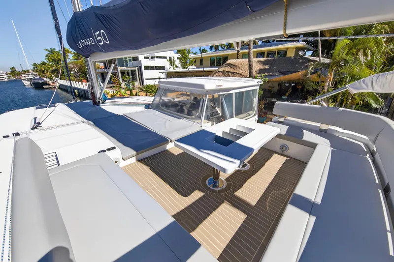 Slide: The Image of Luxurious 2022 Leopard 50 catamaran with spacious outdoor seating and modern design. - 7