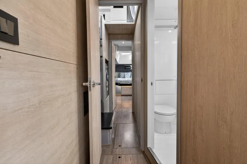 Slide: The Image of Modern kitchen interior on 2022 Leopard 50 yacht, featuring sleek appliances and ample natural light. - 82