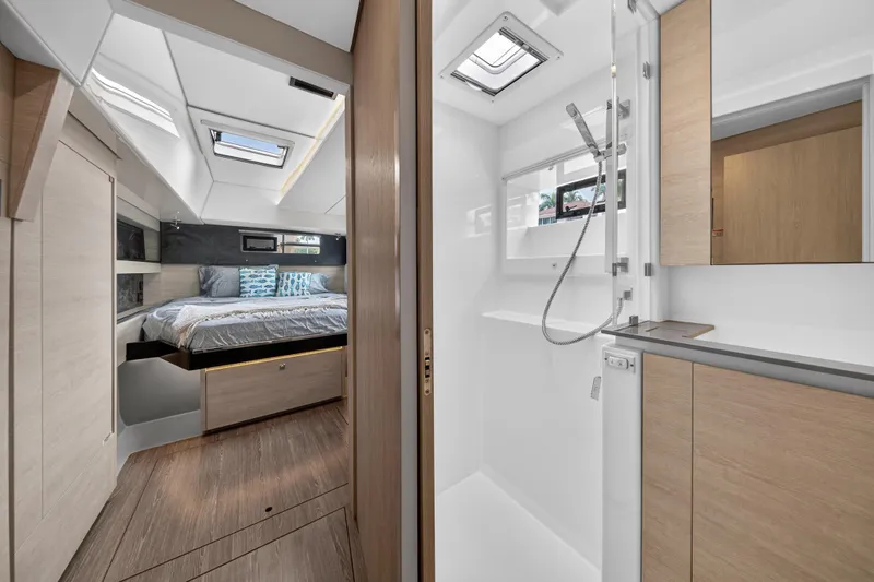 Slide: The Image of Modern kitchen interior on a 2022 Leopard 50 yacht, featuring sleek appliances and ample counter space. - 84