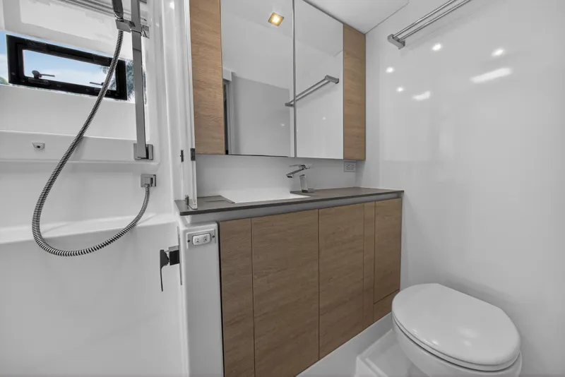 Slide: The Image of Modern kitchen with stainless steel appliances on a 2022 Leopard 50 yacht. - 86