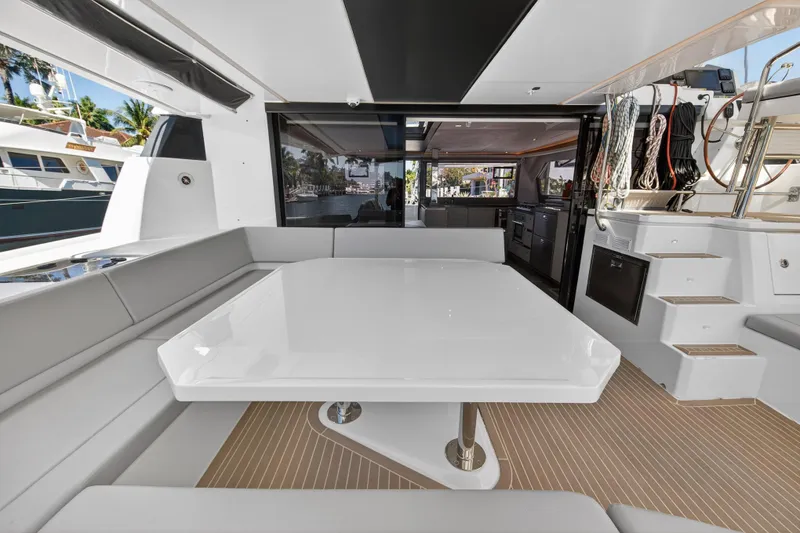 Slide: The Image of Luxurious interior of 2022 Leopard 50 yacht with waterfront view and modern seating area. - 9