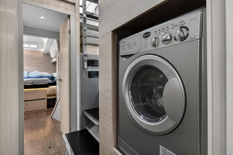 Slide: The Image of Modern kitchen interior on 2022 Leopard 50 yacht with large window view. - 90