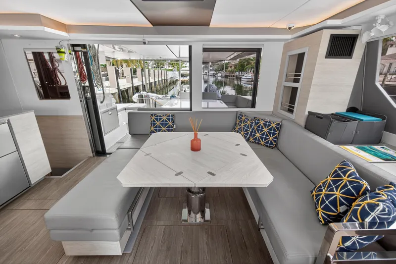 Slide: The Image of Modern kitchen on 2022 Leopard 50 yacht with sink, toaster, and scenic window view. - 92