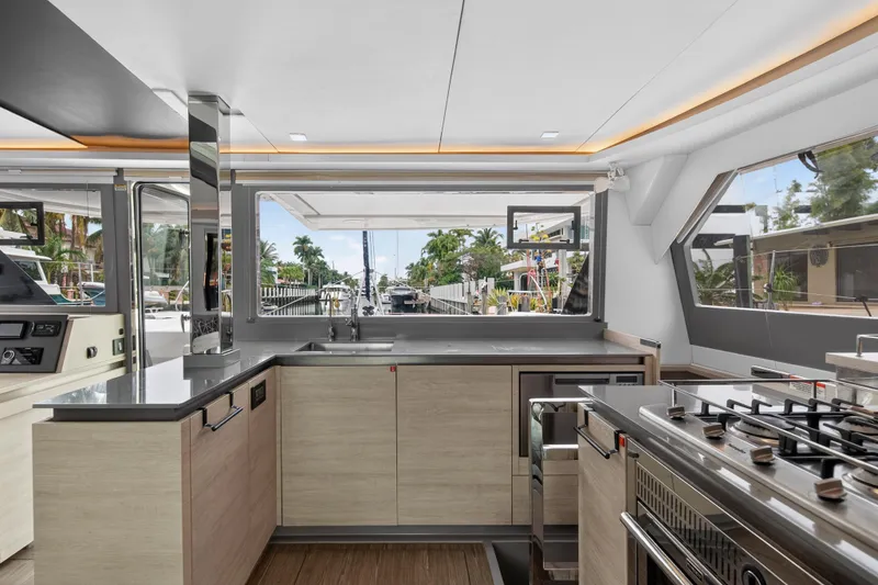 Slide: The Image of Luxurious interior of 2022 Leopard 50 yacht with modern seating and navigation area. - 93