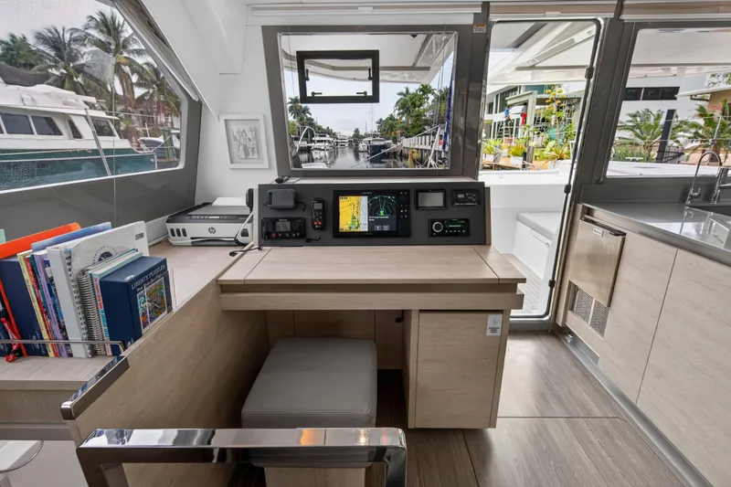 Slide: The Image of Interior of 2022 Leopard 50 yacht with modern seating and sleek staircase. - 97