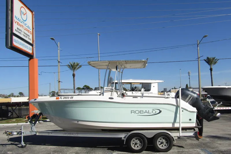 The Image of 2019 Robalo R202 Explorer boat on trailer at Nautical Ventures dealership. - 0