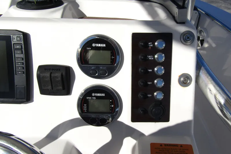 Slide: The Image of Control panel of a 2019 Robalo R202 Explorer boat with Yamaha gauges and switches. - 20