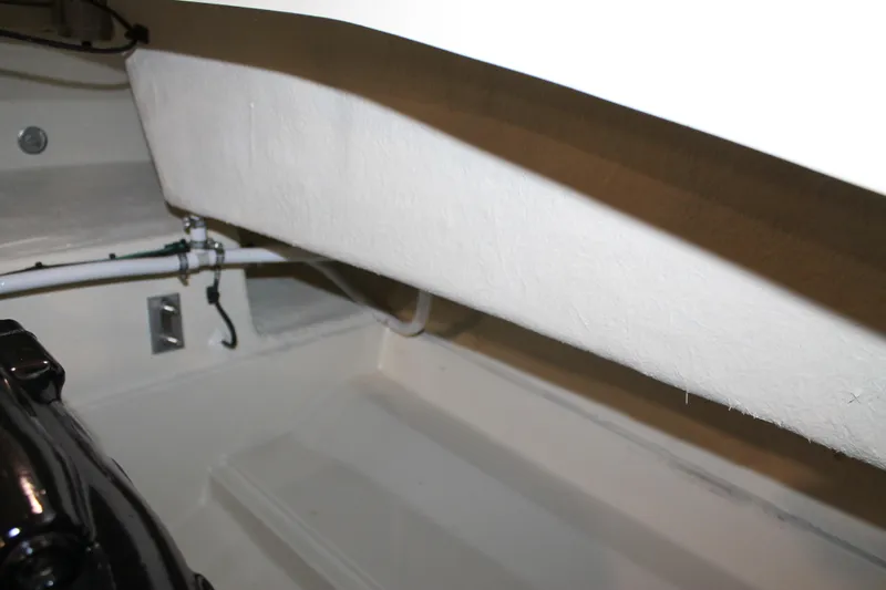 Slide: The Image of 2026 Chris-Craft Sportster 25 interior detail, showcasing sleek design and craftsmanship. - 26