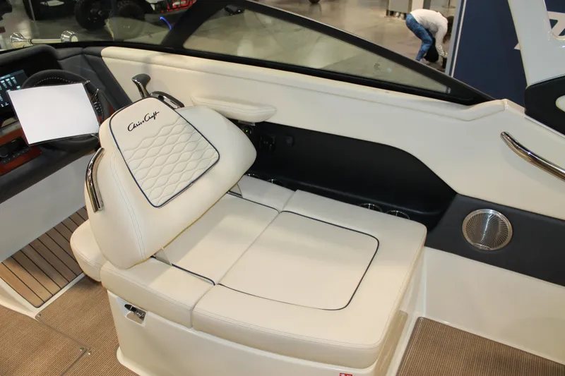 Slide: The Image of 2026 Chris-Craft Sportster 25 interior with luxurious white seating and elegant design. - 31