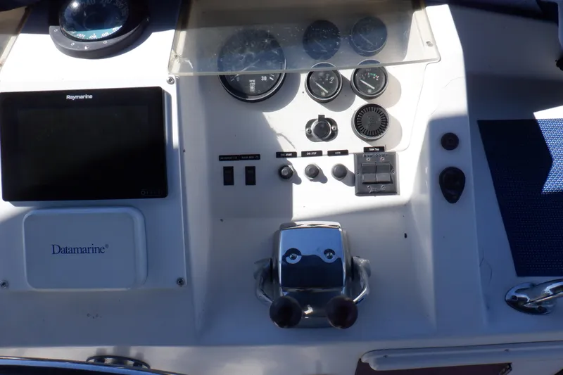 Slide: The Image of Control panel of a 1990 Marine Trader 47 Tradewinds yacht with navigation instruments. - 15