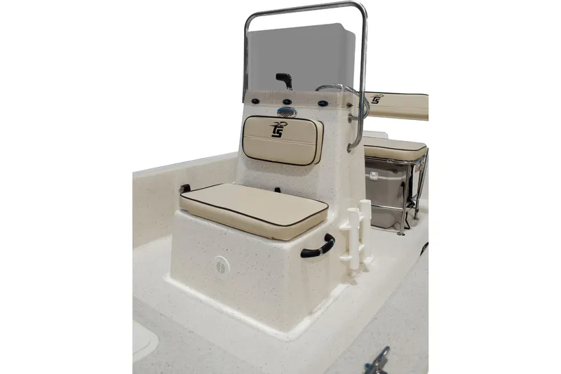 Slide: The Image of 2026 Carolina Skiff E18 JVX CC boat with Suzuki engine, displayed indoors. - 2