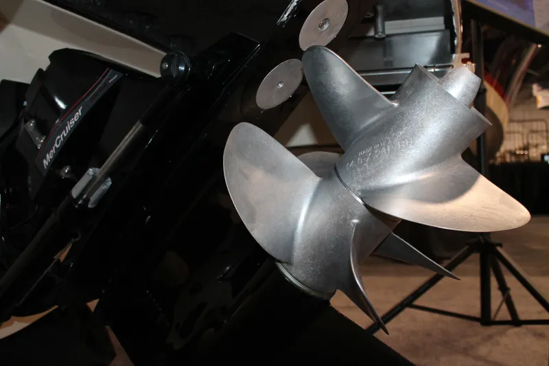 Slide: The Image of Close-up of a 2026 Chris-Craft Launch 28 GT boat propeller and MerCruiser engine. - 22