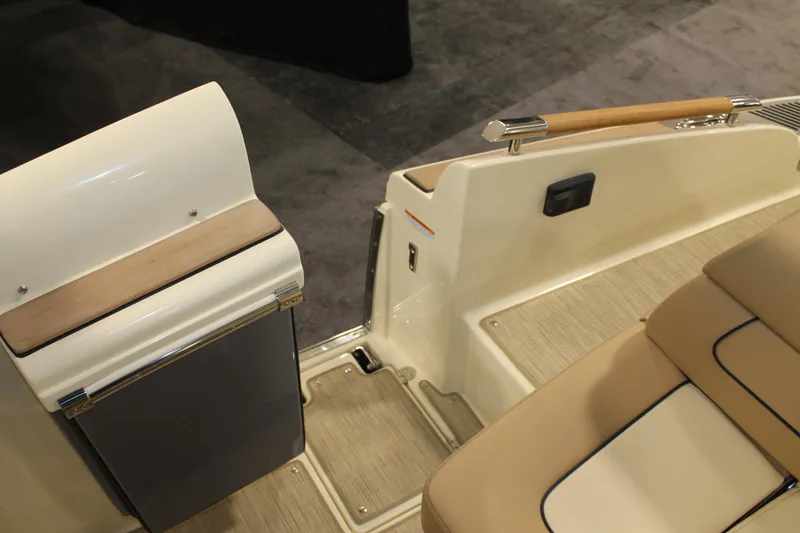 Slide: The Image of 2026 Chris-Craft Launch 28 GT interior, featuring elegant seating and sleek design elements. - 32