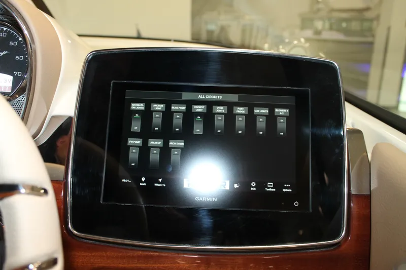 Slide: The Image of 2026 Chris-Craft Launch 28 GT dashboard with Garmin touchscreen display. - 39