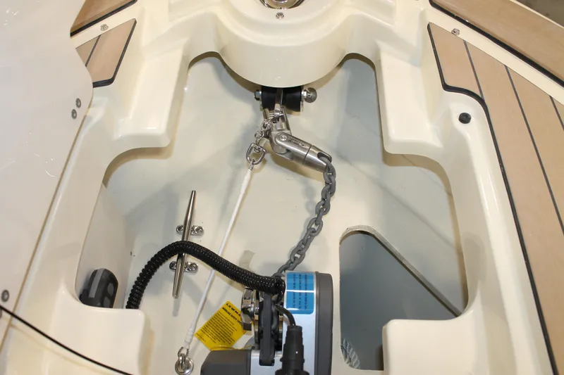 Slide: The Image of 2026 Chris-Craft Launch 28 GT anchor compartment with chain and winch system. - 42