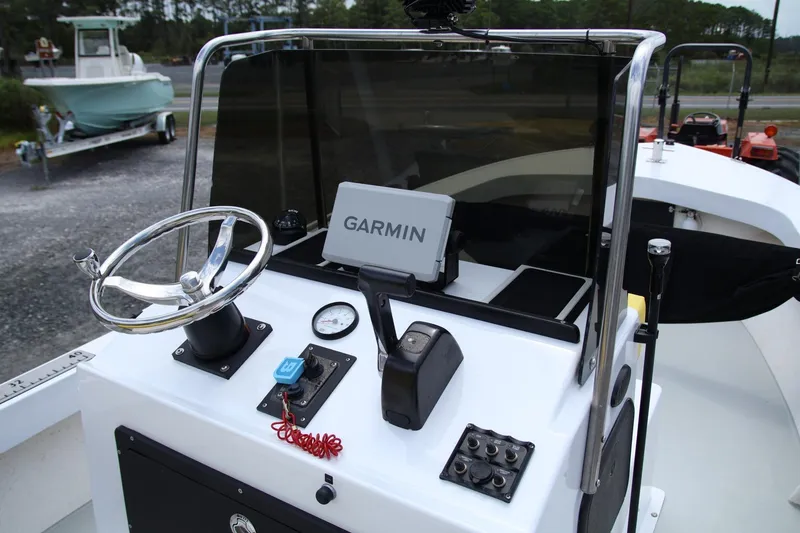 Slide: The Image of 1988 Parker 1801 Center Console boat dashboard with Garmin navigation system. - 10