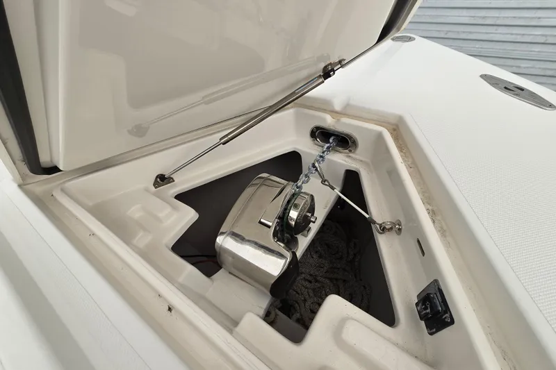 Slide: The Image of Anchor compartment of 2010 Jupiter 34 FS boat with chain and winch system. - 17