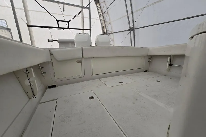 Slide: The Image of 2010 Jupiter 34 FS boat interior under a protective canopy. - 22