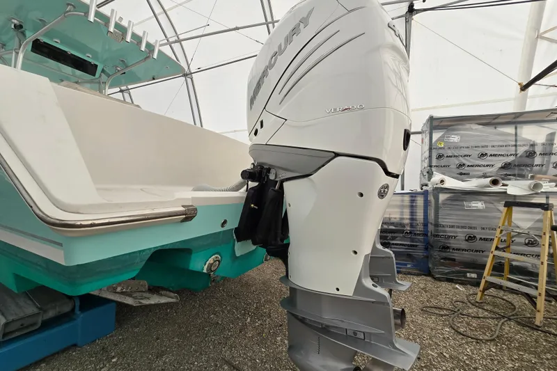 Slide: The Image of 2010 Jupiter 34 FS boat with Mercury Verado outboard engine in storage. - 4