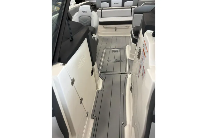 Slide: The Image of Interior view of 2026 Chaparral SSX 4 boat, featuring sleek seating and modern design. - 26