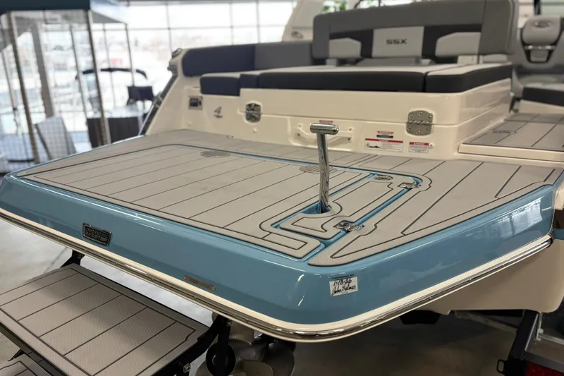 Slide: The Image of 2026 Chaparral SSX 4 boat with sleek swim platform and modern design. - 9