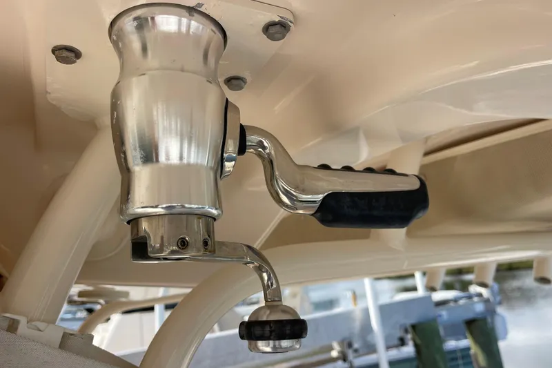 Slide: The Image of Close-up of a 2021 Grady-White Canyon 271 boat's fishing rod holder. - 12