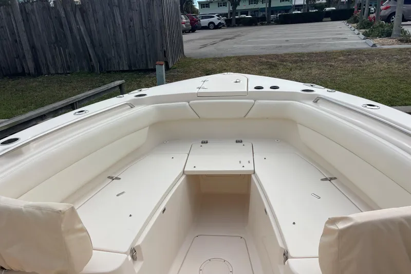 Slide: The Image of 2021 Grady-White Canyon 271 boat interior with spacious seating and storage. - 7