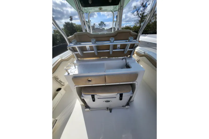 Slide: The Image of 2018 Key West 263 FS boat interior with sink and storage compartments. - 5