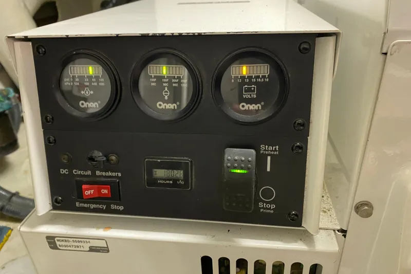 Slide: The Image of Control panel of a 2003 Northern Marine 57 Raised Pilothouse boat. - 28