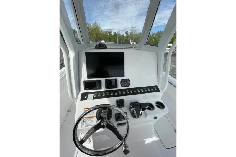 Slide: The Image of Century 2400 Center Console 2022 dashboard with steering wheel, controls, and display screen. - 8