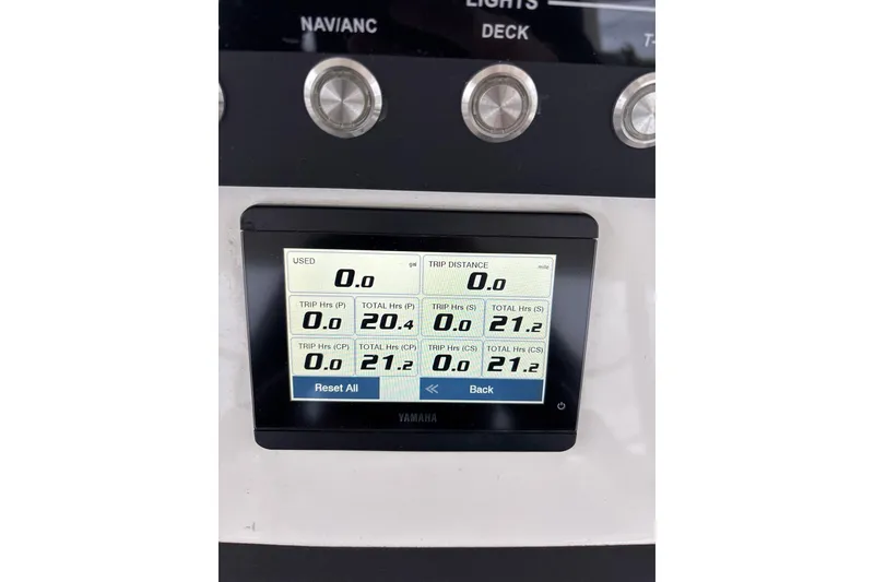 Slide: The Image of Yamaha display on 2023 Regulator 41 boat showing trip and fuel data. - 13