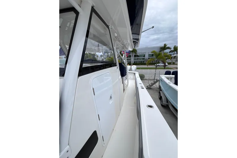 Slide: The Image of 2023 Regulator 41 boat side view with sleek design and modern features. - 7
