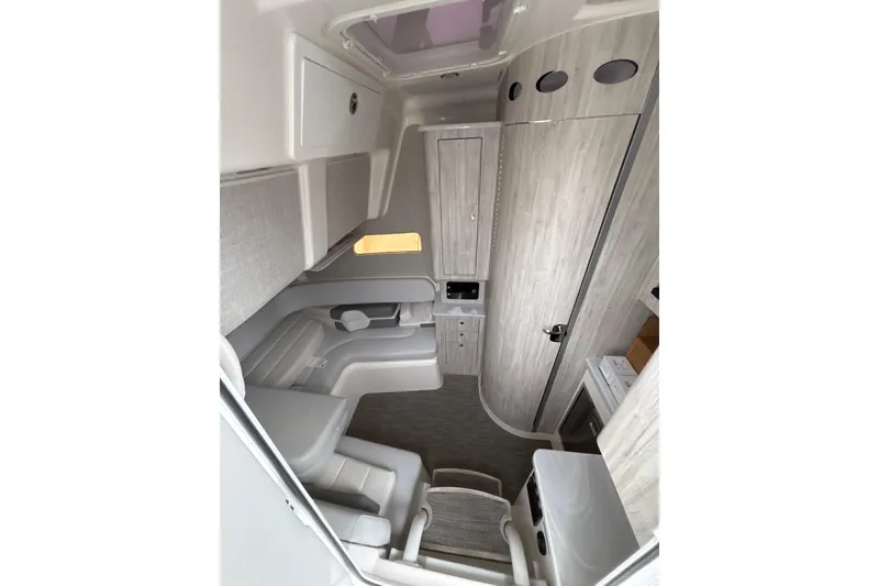 Slide: The Image of 2023 Regulator 41 boat interior with modern seating and cabinetry. - 8