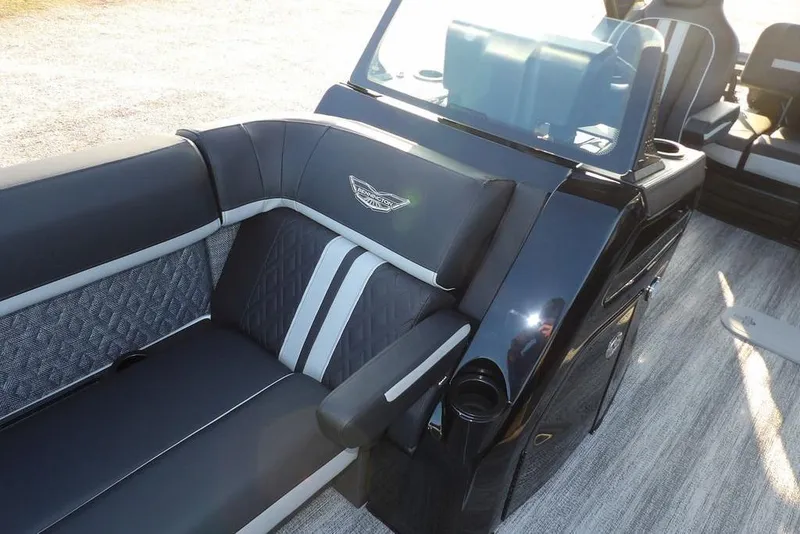 Slide: The Image of 2026 Bennington M Swingback 26 MSB boat interior with luxurious seating and sleek design. - 17